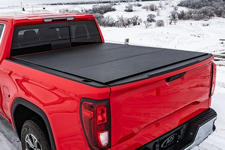 Lomax Professional hard tri-fold tonneau cover aluminum construction